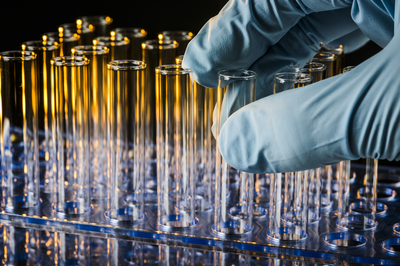 Gloved Hand Handling Pipettes Gloved Hand Handling Pipettes