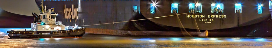 hangingscalesbanner.jpeg Cargo Ship